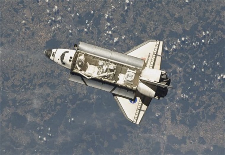 In this May 18, 2011 photo provided by NASA and taken by one of the Expedition 27 crew members aboard the International Space Station, the space shuttle Endeavour prepares to dock with the facility.